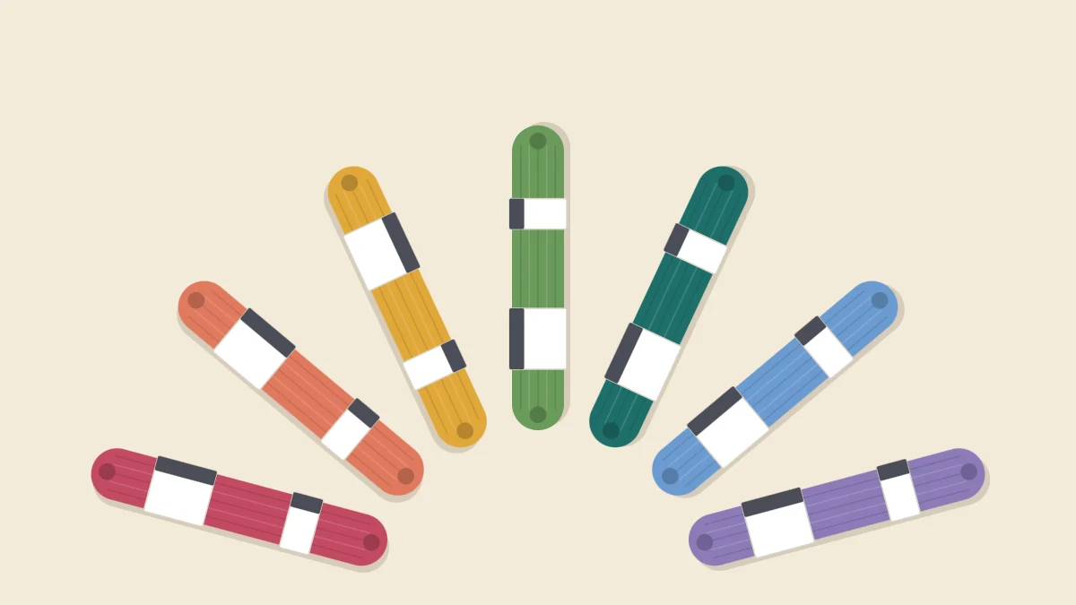 Seven skeins of embroidery floss in different colors arranged in a fan