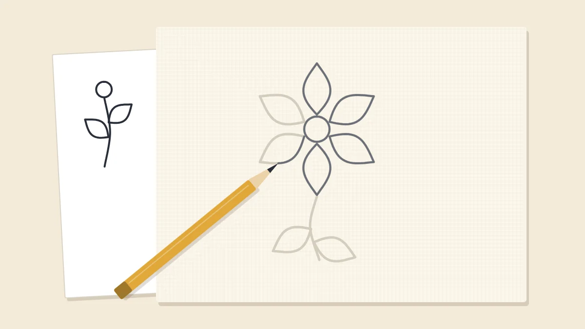 A pencil tracing a flower design onto fabric that lies over a printed pattern